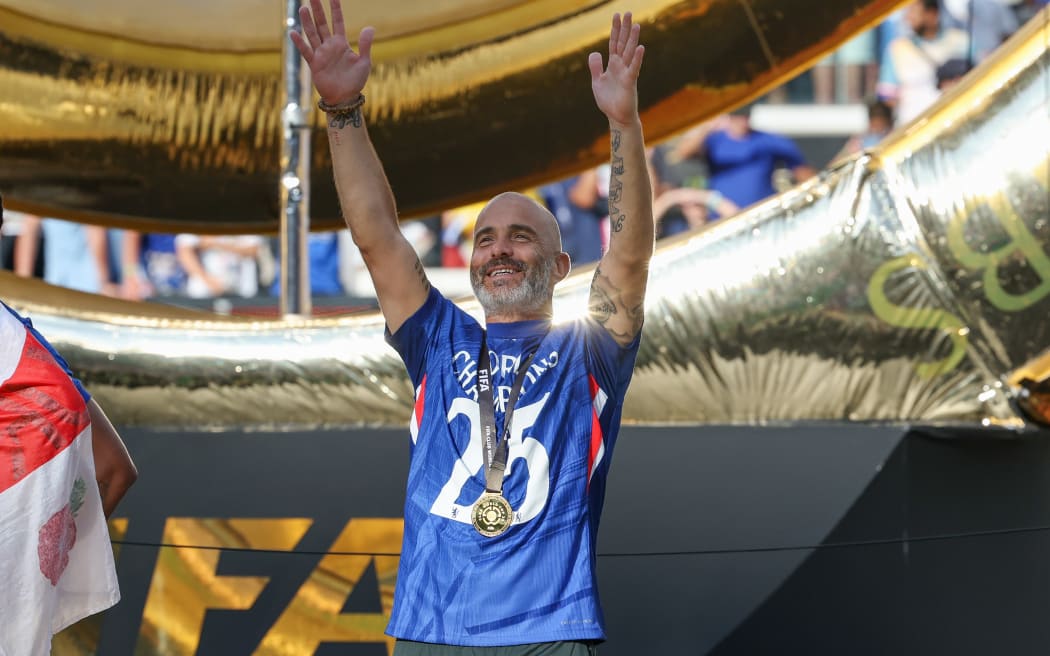 Chelsea head coach Enzo Maresca waives to the crowd after the FIFA Club World Cup Final between Chelsea and Paris Saint-Germain, 2025.