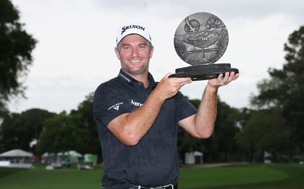MYRTLE BEACH, SOUTH CAROLINA - MAY 11: Ryan Fox of New Zealand poses with the trophy after winning the final round of the ONEflight Myrtle Beach Classic 2025 at Dunes Golf & Beach Club on May 11, 2025 in Myrtle Beach, South Carolina.   Andy Lyons/Getty Images/AFP (Photo by ANDY LYONS / GETTY IMAGES NORTH AMERICA / Getty Images via AFP)