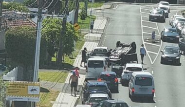 Auckland crashes: Car flips in Birkenhead as power pole brought down in Brown’s Bay accident