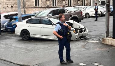 Driver flees after car hits building in central Auckland