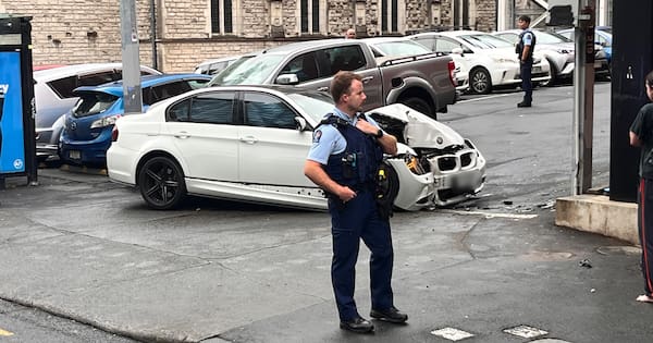 Driver flees after car hits building in central Auckland