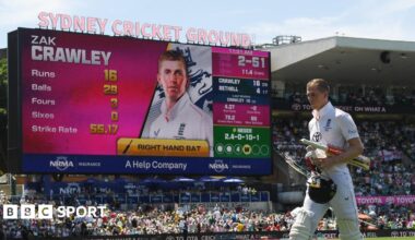 England batter Harry Brook, left, fist-bumps team-mate Joe Root, right