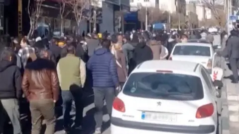 Reuters A still image from a social media video showing people walking in Tehran, Iran. Photo: 30 December 2025
