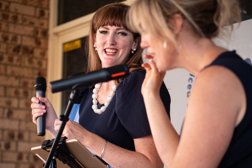 People singing and dancing at the Parkes Elvis Festival.