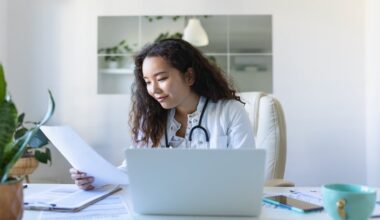 Clinician reviewing HIV post-exposure prophylaxis (PEP) guidance after occupational exposure in a healthcare setting