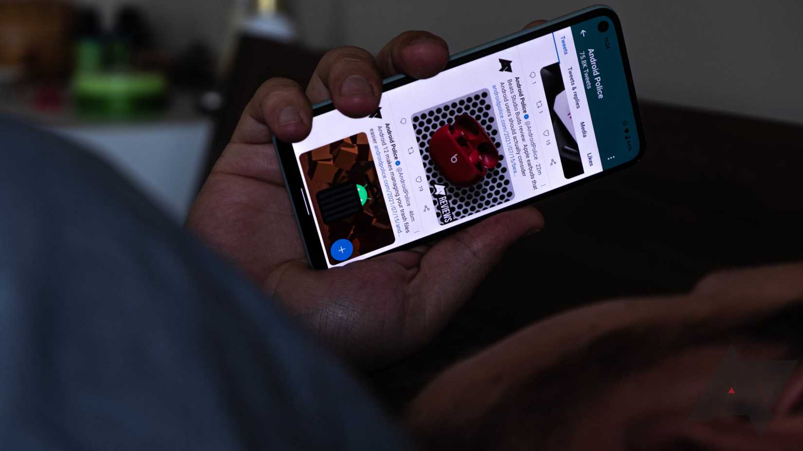 A person doomscrolling on a Google Pixel phone