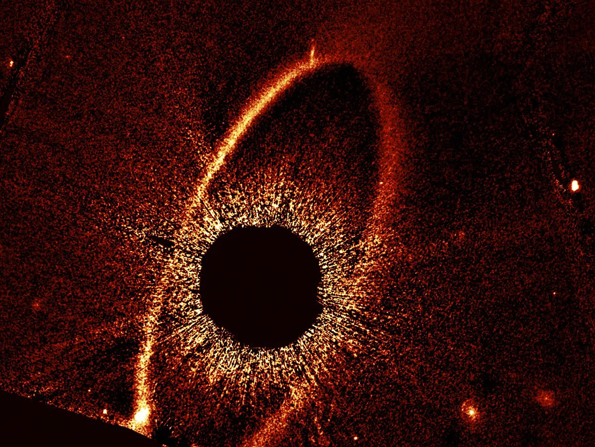 Hubble Space Telescope image showing the debris ring and dust clouds cs1 and cs2 around the star Fomalhaut. Credit: NASA, ESA, P. Kalas (UC Berkeley), J. DePasquale (STScI)