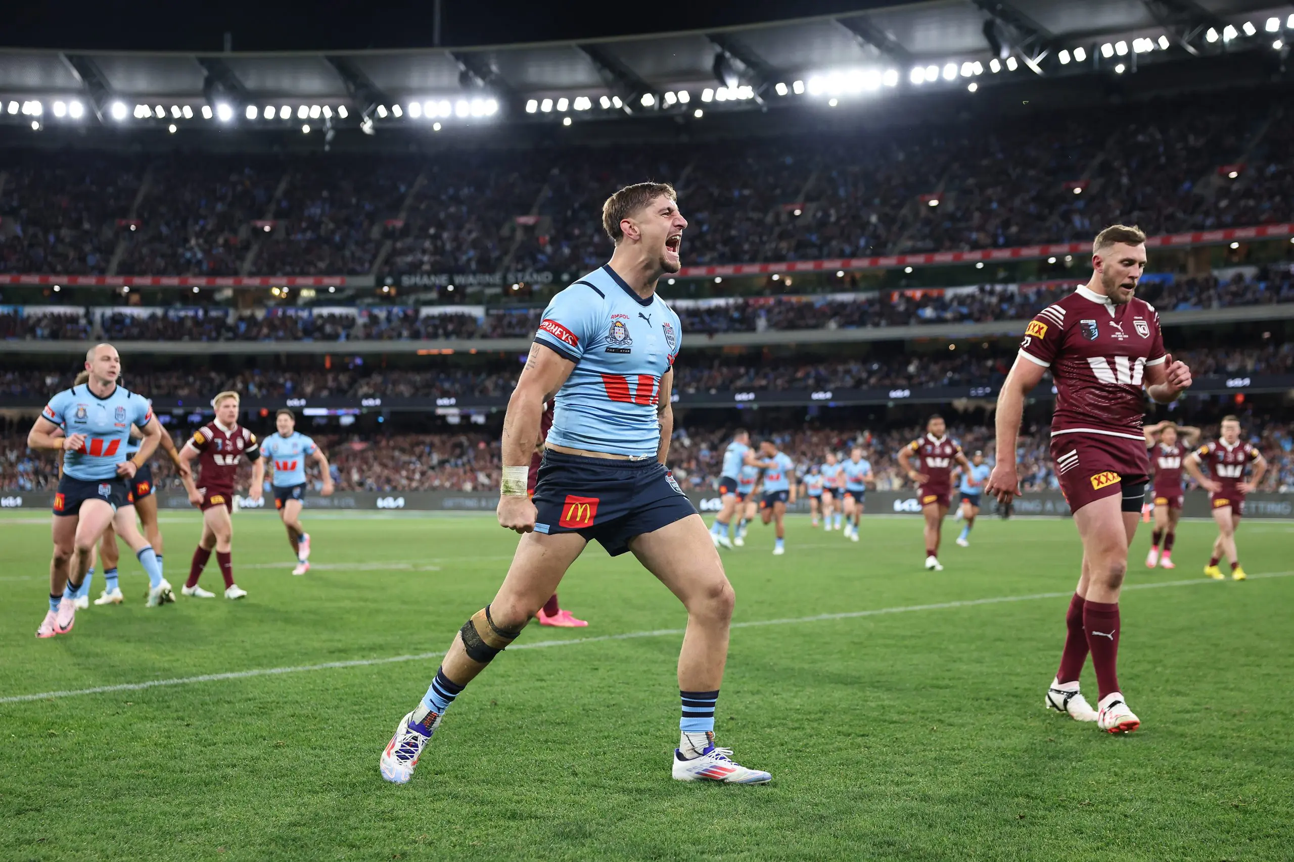 MELBOURNE, AUSTRALIA - JUNE 26: Zac Lomax of the Blues celebrates after scoring a try during game two of the men's State of Origin series between New South Wales Blues and Queensland Maroons at the Melbourne Cricket Ground on June 26, 2024 in Melbourne, Australia. (Photo by Cameron Spencer/Getty Images)