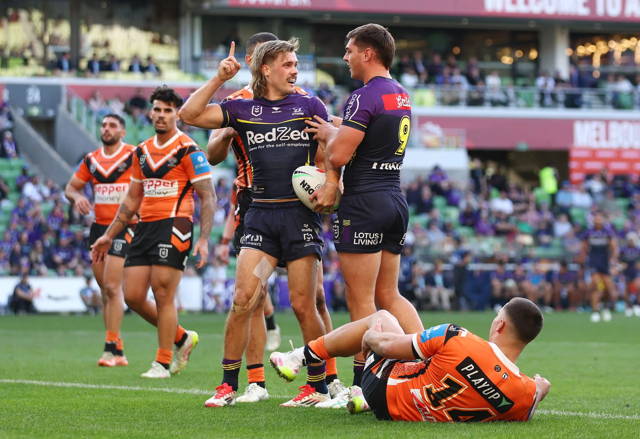 MELBOURNE, AUSTRALIA - MAY 11: Ryan Papenhuyzen of the Storm celebrates after scoring a try before it was disallowed during the round 10 NRL match between Melbourne Storm and Wests Tigers at AAMI Park, on May 11, 2025, in Melbourne, Australia. (Photo by Mike Owen/Getty Images)
