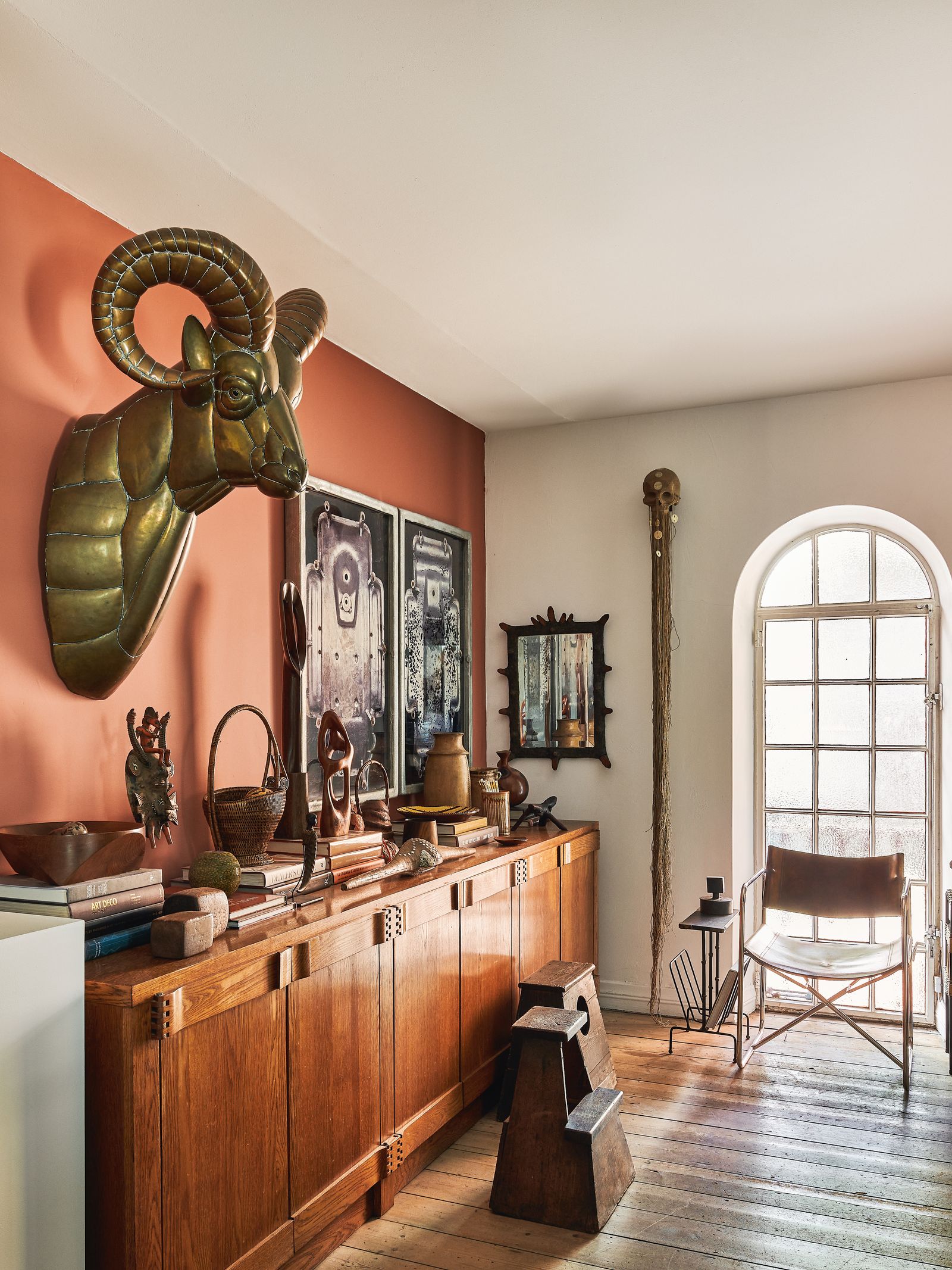 Image may contain Indoors Interior Design Furniture Sideboard Home Decor Wood Architecture Building and Dining Room