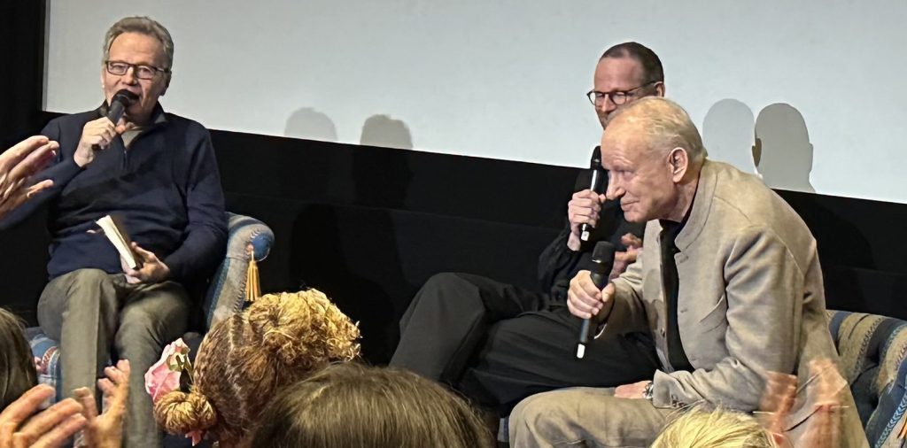 Bryan Cranston Hosts Sentimental Value Love-In For Stellan Skarsgård