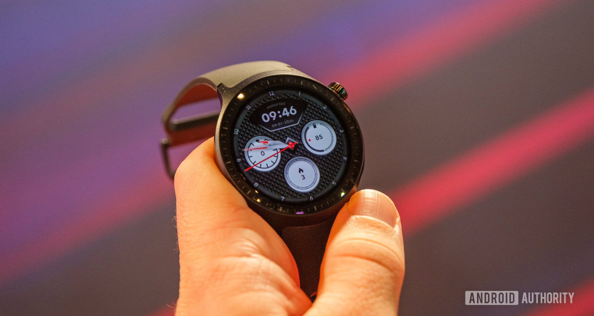 Motorola Moto Watch face in hand