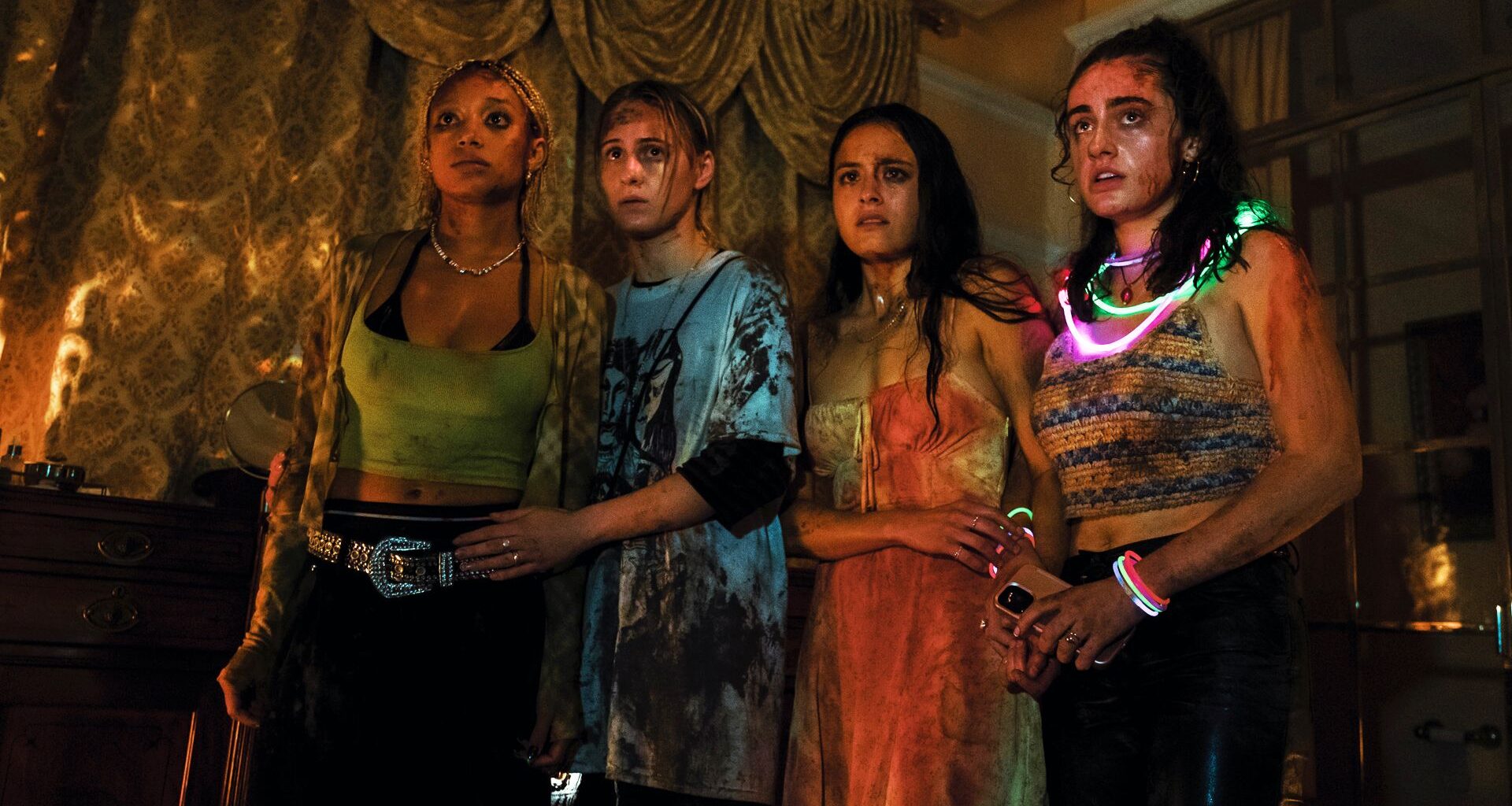 Four stars of Bodies Bodies Bodies look scared at something off-screen