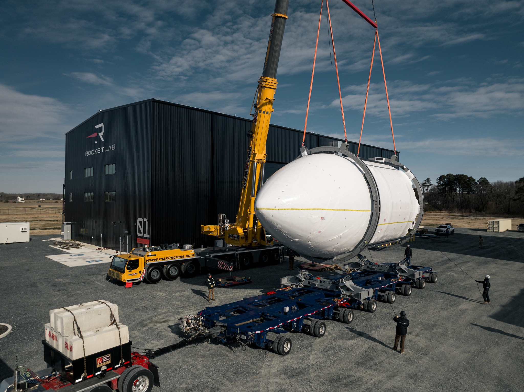 A rocket fairing is being transported