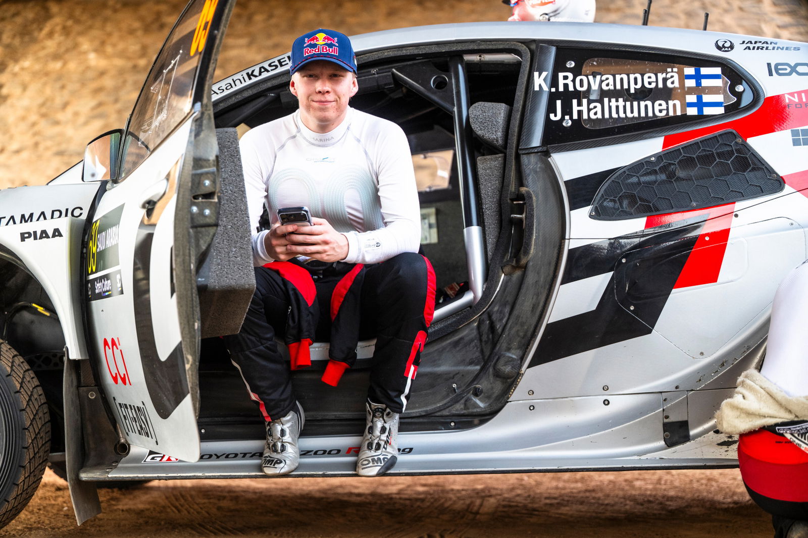 Kalle Rovanpera sits in his Toyota GR Yaris Rally1 car at Rally Saudi Arabia.