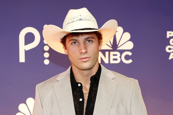 Rob Rausch wearing a cowboy hat and looking ahead.