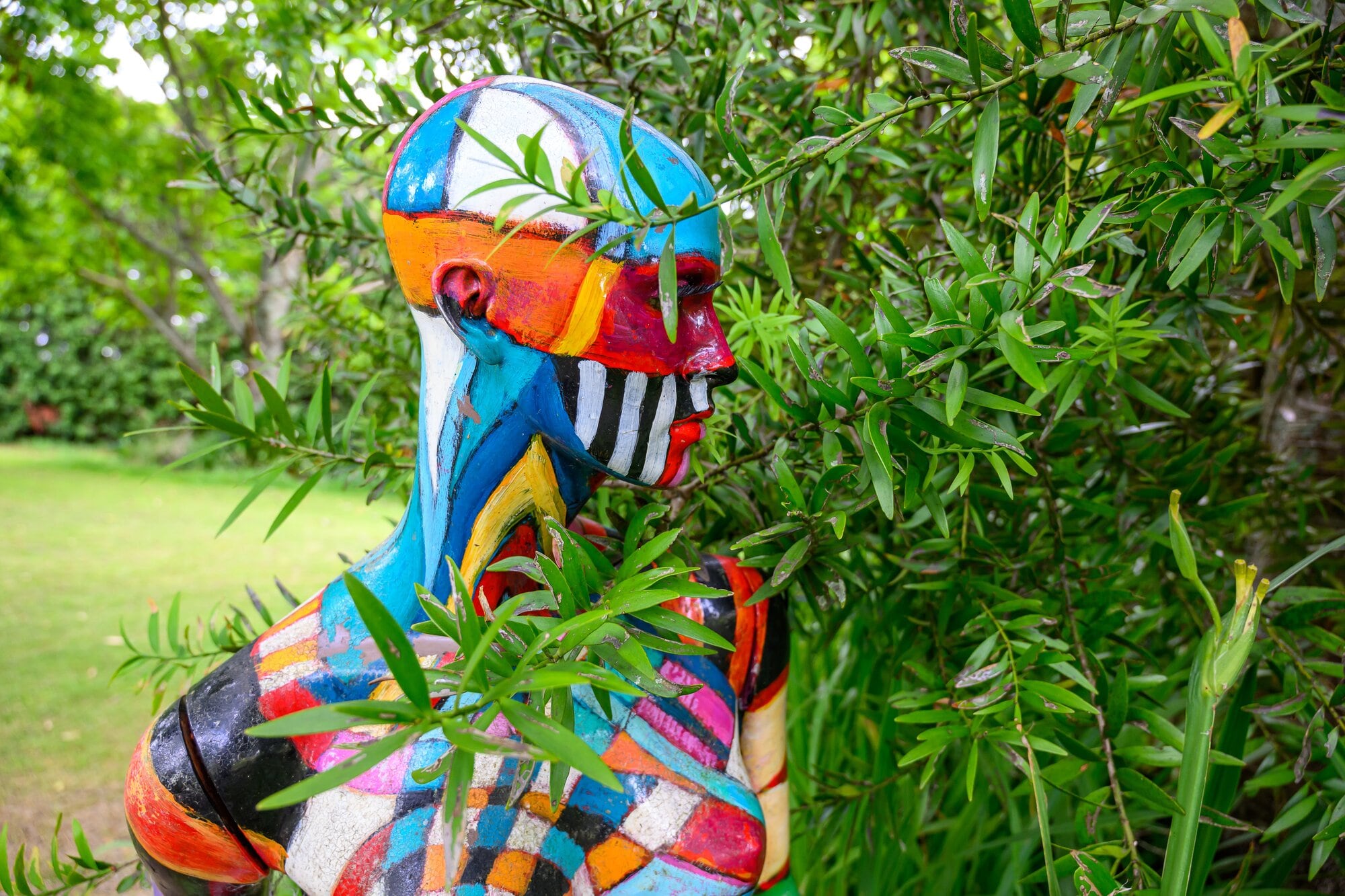 A colourful mannequin by New Zealand artist Sue Lund installed on the grounds of Jens Mueller’s rural property in Pyes Pā. Photo / David Hall