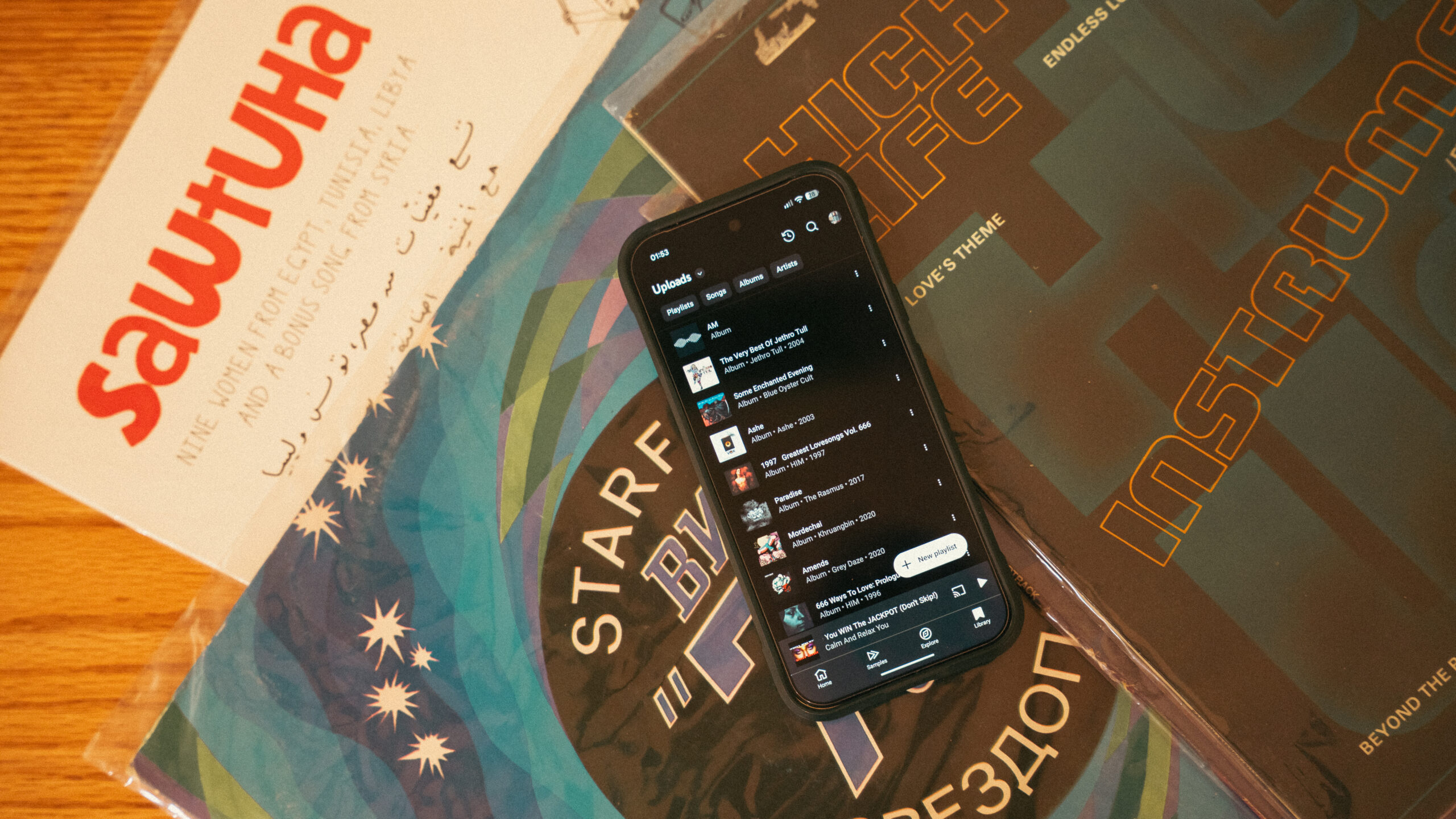 YouTube Music uploaded music on a stack of records