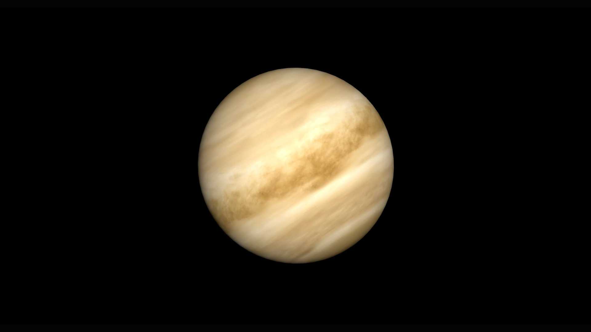 A close up of the planet Venus in the darkness of space, its yellow surface prominent