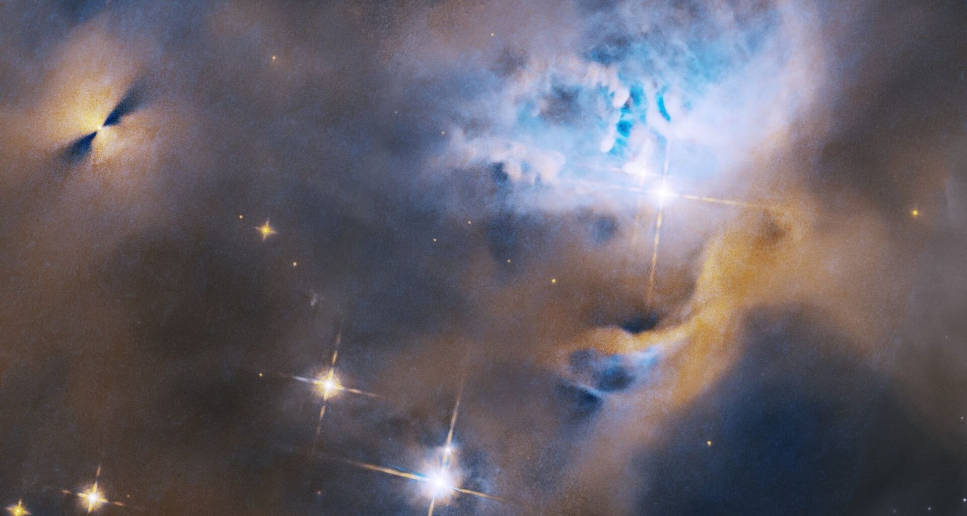 Clouds of blue and gold are mixed with bright twinkling blue and white lights against a dark background