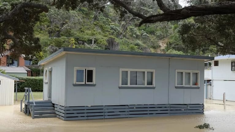 A bach in a lake at Ōakura. Photo: RNZ/Peter de Graaf