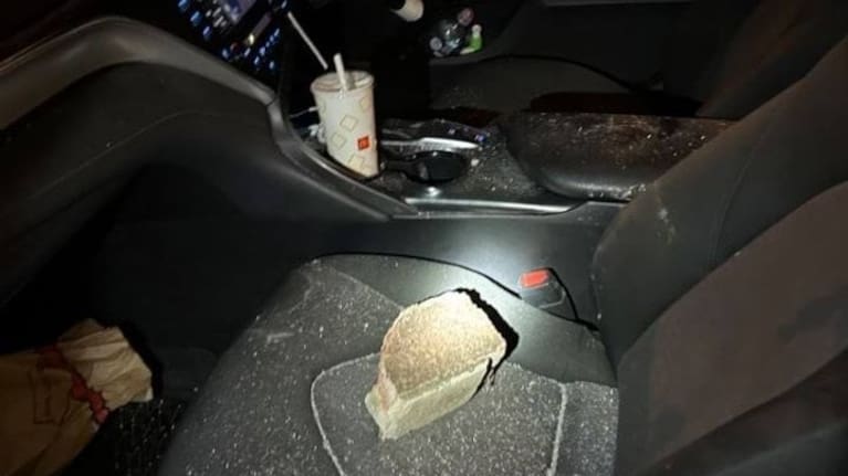 A brick on the passenger seat of a vehicle targeted on a Melbourne highway.