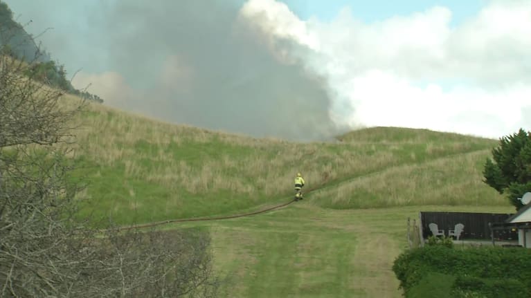 A firefighter at the scene in Mount Wellington today.