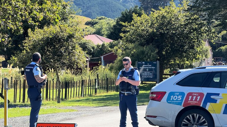 Police block the road near the scene at Paekākāriki Hill this morning. 