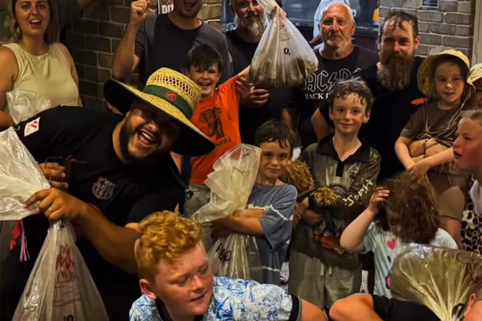 Guests with their cane toad bags.