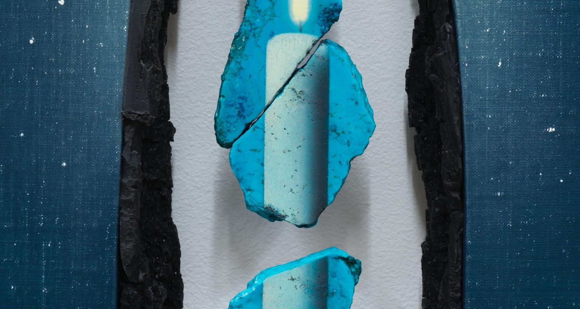 a painting by Dabin Ahn that cuts open in the middle to reveal a fragmented image of a taper candle