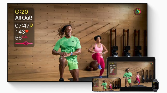 two people are indoors and one leads the other in an apple fitness plus hiit workout