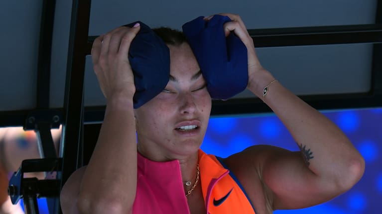 Aryna Sabalenka of Belarus places ice packs to her face during her quarterfinal match against to Iva Jovic of the US at the Australian Open tennis championship in Melbourne.