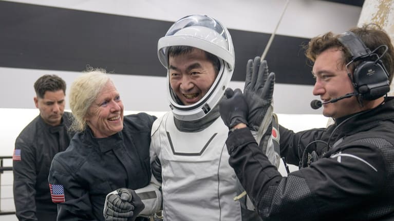 Astronauts onboard the SpaceX recovery ship.