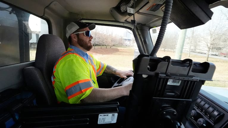 Austin Felts of the Nashville Department of Transportation drives a truck deploying salt brine on roadways.