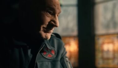 side view Patrick Stewart as Professor X looking at someone sitting across from him