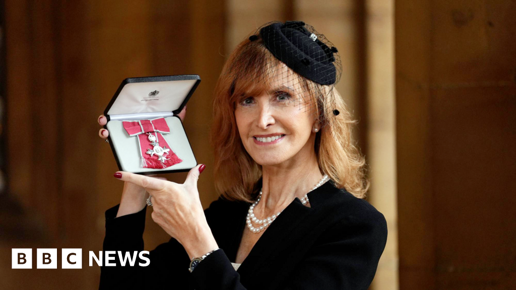 Jackie Bird accepts MBE from Princess Royal at Windsor Castle