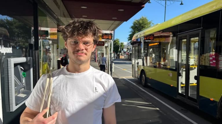 Ben Lake waits for a bus in Wellington.