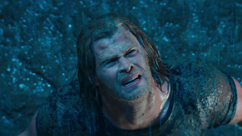 Thor staring up in the rain in Thor (2011)