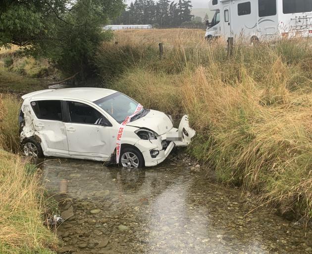 The car came to rest in Fosters Creek. Photo: Bill Gordon/supplied 