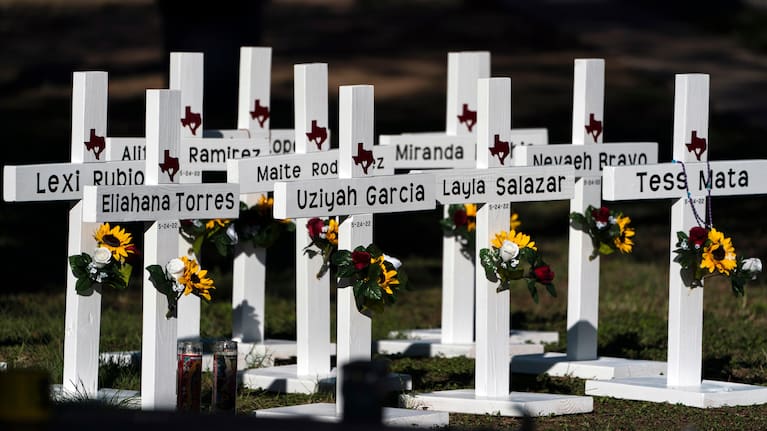  Crosses with the names of shooting victims are placed outside Robb Elementary School in Uvalde, Texas.
