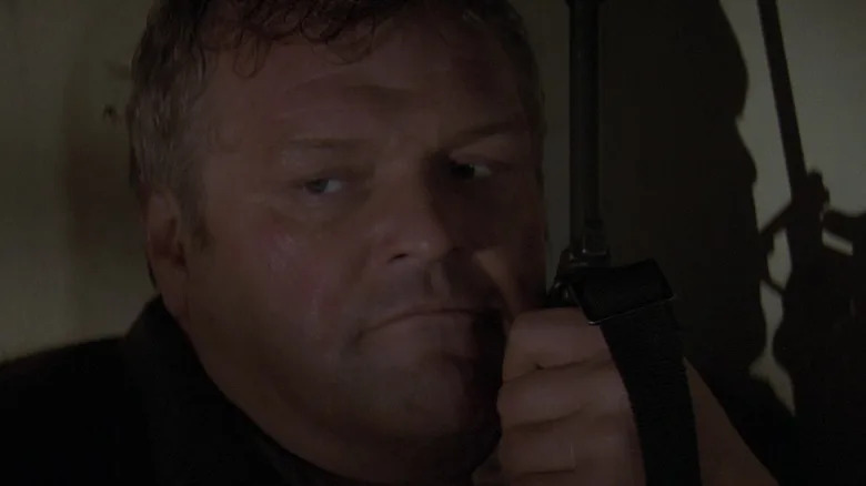 Brian Dennehy's Sheriff William Teasle talks on a two-way radio in First Blood
