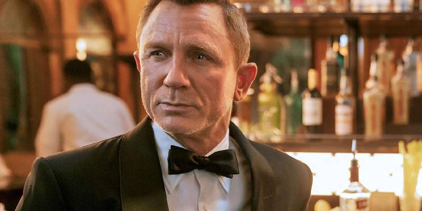 Daniel Craig as James Bond at a bar in No Time To Die