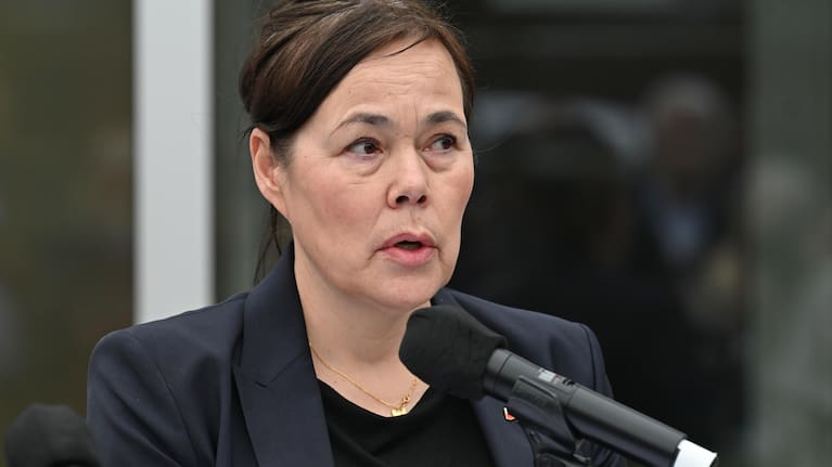 Greenland's Foreign Minister Vivian Motzfeldt speaks at a news conference.