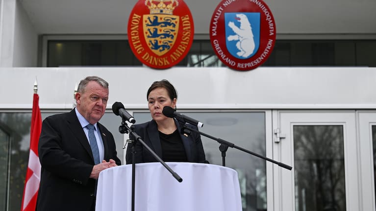 Denmark's Foreign Minister Lars Løkke Rasmussen and Greenland's Foreign Minister Vivian Motzfeldt speak at a news conference.