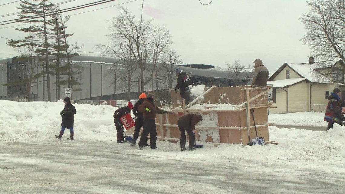 Volunteers help artist with new snow sculpture honoring Sean McDermott