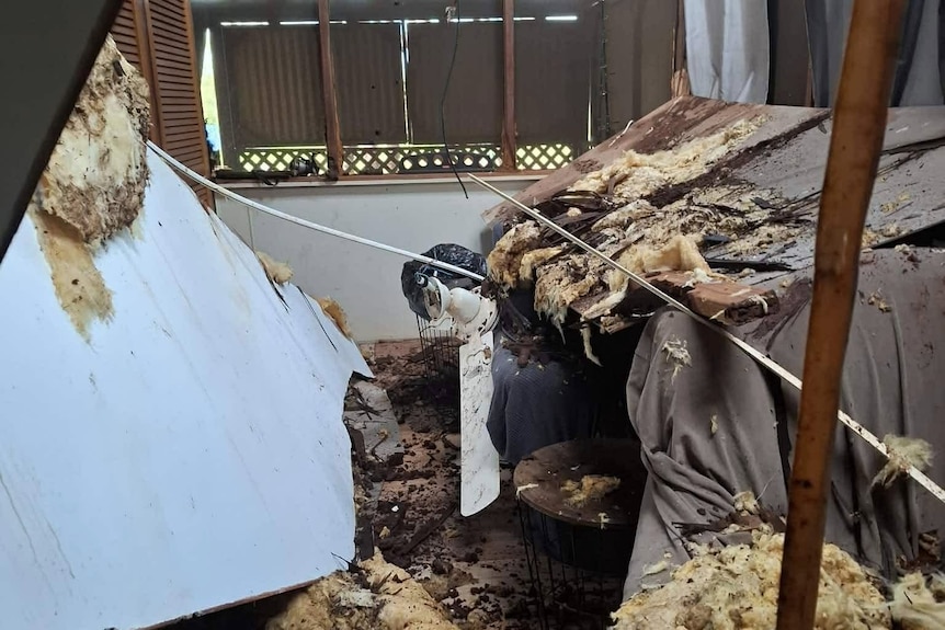 Debris in a room after a cyclone.