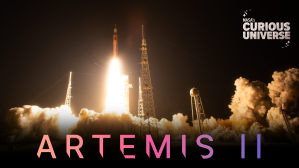 Wide shot of Artemis I liftoff. The Curious Universe logo is in the upper right corner and Artemis II is spelled in large type across the bottom.
