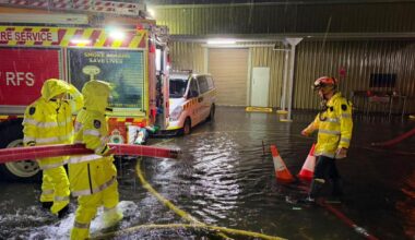 Evacuations, woman killed as storms hammer eastern Australia