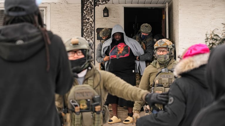 Garrison Gibson is arrested by federal immigration officers Sunday, Jan. 11, 2026, in Minneapolis.