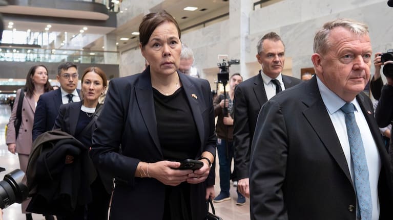 Greenland Foreign Minister Vivian Motzfeldt, Denmark's Ambassador Jesper Møller Sørensen, rear, and Danish Foreign Minister Lars Løkke Rasmussen.
